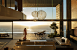 太阳,人,住宅内部,沙发,建筑_478169445_Woman in modern house overlooking ocean_创意图片_Getty Images China