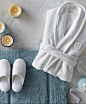For a skin-pampering indulgence that rivals a day at the spa, wrap yourself in our ultra-soft robe and cozy slippers. Robe features a plush 280 gsm in luxuriously absorbent Turkish cotton and an ultra poly-fleece exterior for sumptuous warmth and relaxati