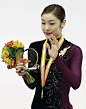 GOYANG South Korea Reigning Olympic figure skating champion Kim Yu Na waves after winning the South Korean national championships in Goyang on Jan 5...