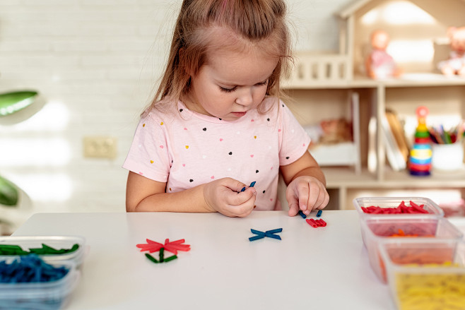 little-girl-playing-...