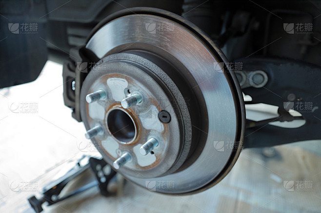 Disc Brakes, rotors, caliper, pads, on an automobi