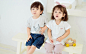 Boy and Girl Sitting on Bench