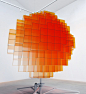 vincent leroy's sunrise installation rotates to display a globe of blurry light