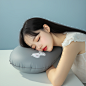 taotao_74251_There_is_a_gray_inflatable_pillow_on_the_table_and_3759647f-b97e-4d05-ad6a-72b1a1a182cd