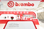 BREMBO, Autoshow Beijing : The Brembo stand has been thought as a box that opens itself on the audience on the two sides. All the components have been designed with order and homogeneity, to reflect the fluency of the Brand approach to the way of thinking