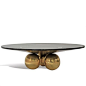 Another example of an esthetically impressive piece that distinguishes itself by design and luxurious materials and ads a distinctive charm to a room. The top is mantled in goatskin, resting on a base that is composed of 3 brass spheres that have been bru