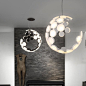 Moon LED Chandelier : The chandelier designed by Hans in Brooklyn, New York, looks more like a treated piece of art. He said, I have been looking for a simple way, which is probably what most industrial designers think. Benefits: Unique design and appeara