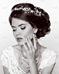 Retro woman. Beautiful bride with elegant hairstyl