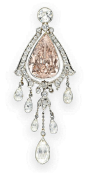 A BELLE EPOQUE COLORED DIAMOND BROOCH