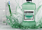 Listerine Teeth Defence : This key visual was created for the Listerine Teeth Defence campaign. Bottle, splash, brush, floss and background were created on separate layers with transparency so they could be moved around to fit different type executions an