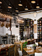 Restaurant interior & design Arches and metal mesh over bar