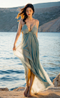 05837-1515898542-young korean girl,black hair,large breasts,mugglelight,_On the shores of the Aegean Sea,a modern-day Greek goddess commands atte