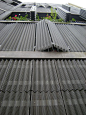 crinkle-cut perforated shutters / screen 17/19, rue des Suisses. Social housing. Paris, France.: 