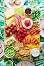 This is the ultimate cheeseboard for summertime! Cheese and herbs are coupled with summer fruits, nuts, meats, guacamole and rhubarb compote.