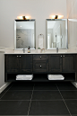 Example of a transitional master black and white tile and porcelain tile porcelain tile, black floor and double-sink bathroom design in Other with shaker cabinets, dark wood cabinets, a two-piece toilet, gray walls, an undermount sink, quartz countertops,