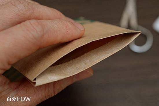 怎么用牛皮纸袋折叠一个多用途钱包(图文教...