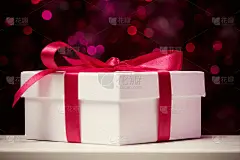 礼品盒与红色蝴蝶结对散焦灯光