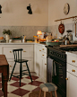 Photo by Sara Charlesworth on February 20, 2024. May be an image of range hood, kitchenware, kitchen table, stove, indoors and kitchen.