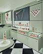 Photo by Prada Beauty on April 19, 2024. May be an image of sink, fragrance, hand cream, perfume, display case, cosmetics, indoors and text.