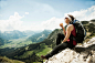 Mature woman sitting on cliff, hiking in mountains, Tannheim Valley, Austria by Radius Images on 500px