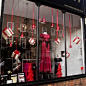 Christmas Window Displays for Homes | like the colors red and white -- very attention grabbing.