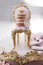 Cake topper featuring an upright chair stacked with pink and gold dishes. All made entirely out of sugar. Wow. Cake Opera Co.: