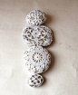 Crochet covered rocks - paper weights, table numbers at your wedding. So cute.