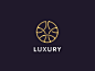 其中可能包括：the luxury logo is shown in gold and black, with a circular design on it