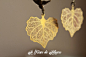 黄铜质地 镂空树叶与小鸟耳环
