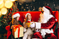 group-kids-sitting-with-santa-presents-christmas-eve_1303-12199