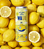 a can of waju surrounded by lemons