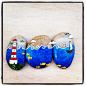 Painted stones ... LOL. A rock triptych ... gotta love it. :-)