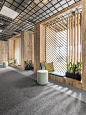 波兰BIURO呼叫中心暖色调的办公空间设计