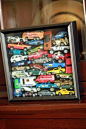 Shadow box of favorite hot wheels