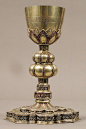 chalice, very classy, write century, but early, wrong local, but area a merchant would travel too, same base as the cups I have.. same shot glass idea, matching set., maybe: