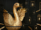 The Golden Goose : Inspired by fairy tales and Moroccan architecture, we created a room in which a shining, golden goose is caged, her eggs collected one by one and suspended inside arches carved into the walls. The goose is made entirely out of golden pa