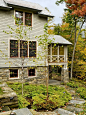 Shingle Style House : Situated on a hillside with long-range views to Mt. Ascutney, this Hanover home is a reinterpretation of the classic shingle-style houses of the late 19th century. It features high quality