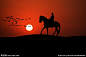 黄昏日落骑马剪影图片