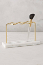 Anthropologie Brass Makeup Brush Holder: This brass makeup brush holder is just what your mom’s vanity is missing. Gift this modern chic addition to complete her beauty decor ensemble.