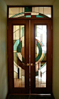 This Art Deco entryway is one of a series of art glass door panels in this contemporary styled high-rise Chicago condominium.