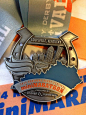 The Kentucky Derby Mini Marathon was fabulous! Such a treat to run through Churchill Downs (though it took me longer than two minutes) and around Louisville. Love this medal! April 2014.: 