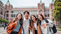 Generate a photo featuring Asian teenagers walking sideways with their backpacks, full of joy and laughter, against a sunny background with the iconic Beijing University building behind them, without the need for a complicated setup.