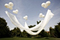 Floating Canopy:  The balloons are attached to the ground with fishing line.@YongQu