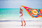 Little girl have fun with beach towel during tropical vacation by Dmitry Travnikov on 500px