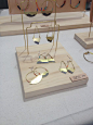 Favorite!  wire earring hangers pegged into plywood!  son of a sailor jewelry display: