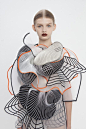 Noa Raviv created textiles with distorted grid patterns stretched across the fabric, resulting in a playful visual illusion. In addition she used 3D printed elements to make bold and intricate shapes. The digitally inspired features are juxtaposed with si