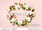 Round frame of white orchids and green leaves on a pink background. Pattern with space for your text, holiday greeting card. Flat lay, top view. Frame of flowers. Floral pattern.