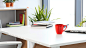 ls7623_Modern_office_desk_with_a_white_top_and_red_mug_books_on_c0dc6d8c-097f-4413-9662-23055741fd08
