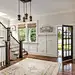 Example of a mid-sized classic dark wood floor and brown floor entryway design in Nashville with beige walls and a glass front door