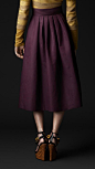 Still love the classic tailored look of the mid length skirt, especially in the plum purple with a chartreuse top!